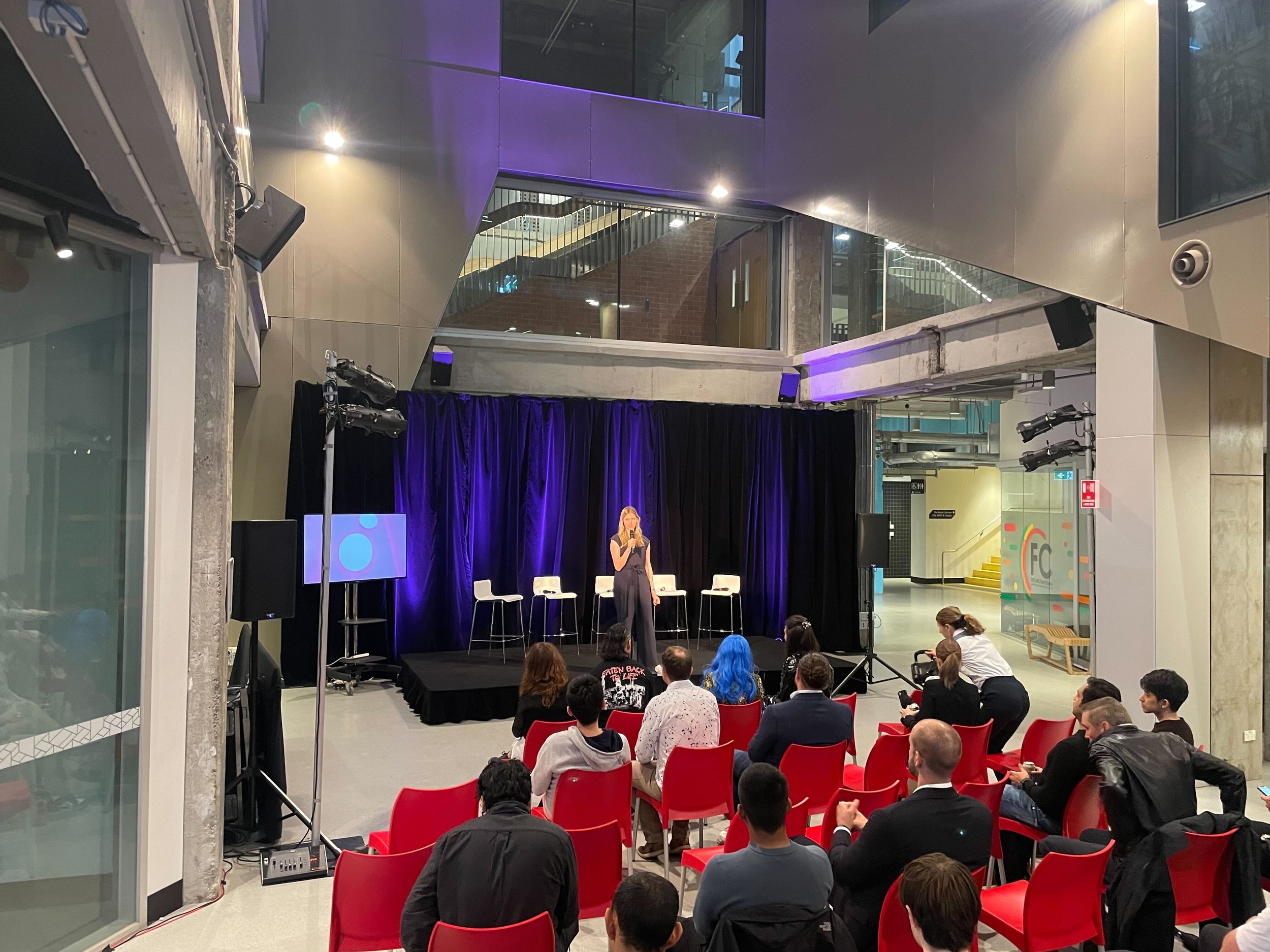 Professor Ellie Rennie welcomes attendees to the Metaverse Madness event